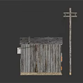 Rusted Wooden House With Blue Roof Metal Fence And Utility Pole On Sandy Ground