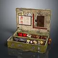 Open Vintage Green Suitcase Filled With Daily Necessities Small Boxes Bottles And