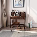Wooden Home Office Desk With Matching Chair Table Lamp Books Photo Frames And Potted Plant