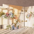 Wedding Backdrop With Double Doors Floral Decor Gold Handles Logo And Scattered Petals
