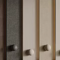 Various Textile Fabric Panels In Neutral Tones With Round Decorative Knobs