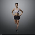 Active Woman in White Sports Bra and Black Shorts Posing with Hands on Hips