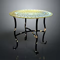 Round Glass Top Table with Ornate Pattern and Black Metal Legs with Gold Accents