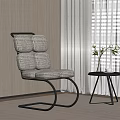 Modern Leisure Chair With Checker Pattern Metal Frame And Side Table With Vase