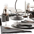 Elegant Modern Tableware Set Featuring Gray Plates Black Napkins Wine Glasses Cutlery And Candle Holders