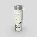 Decorative Ornament Set Featuring Light Green Jasmine Tea Canister With Silver Lid And Bamboo Leaf Pattern