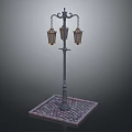 Vintage Ornate Lamp Post With Three Lanterns And Cobblestone Base