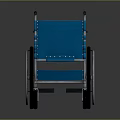 Blue Wheelchair With Lightweight Metal Frame And Large Wheels And Comfortable Footrests