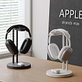 Apple AirPods Max Wireless Headphones With Black White Stand On Wooden Table