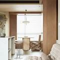 Modern Open Concept Dining and Living Area With Wooden Cabinets Marble Countertop and Green Plants