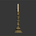 Brass Candelabra With Three Candles And Ornate Design On Black Background
