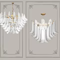 Elegant White Glass Petal Chandeliers With Gold Metal Accents On Gray Wall