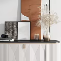 White Paneled Console Table With Abstract Art Vase And Side Cabinets With Display Shelves