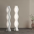 Modern White Wavy Design Floor Lamps With Decorative Bear Figurine And Green Plant