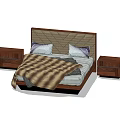 Modern Double Bed With Geometric Pattern Headboard Two Pillows Brown Blanket And Bedside Tables