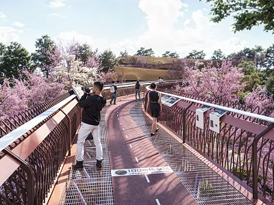 Scenic Park Landscape With Elevated Walkway Metal Railings Blooming Pink Trees And Visitors Strolling 3d model