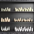 Various Candle Lamps Arranged On Black Layered Shelves For Home Interior Decor