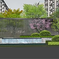 Residential Entrance Gate With Archway Water Features And Greenery Between High Rise Buildings