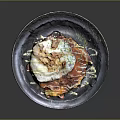 Japanese Style Omurice Topped With Fried Egg Drizzled With Sauce On Black Plate