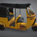 Vintage Yellow and Black Auto Rickshaw With Black Canopy Front Windshield and Wheels