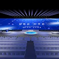 Spacious Conference Venue With Arranged Seats Stage Lights And Large Screen