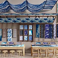 Blue and White Patterned Fabrics Hanging From Ceiling With Tile Samples On Walls And Tables 3d model