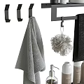 Black Bathroom Storage Rack With Towels Bath Sponge And Toiletries Bottles