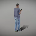 Man in Gray T-Shirt with Blue Jeans Using Smartphone Standing on Black Line Gray Background