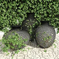 Three Light Colored Woven Vases With Green Vines For Indoor Decoration