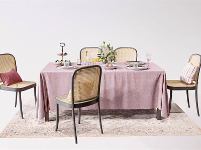 Elegant Dining Table Set With Pink Tablecloth Rattan Chairs Dinnerware And Flower Arrangement 3d model
