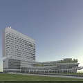 Modern High Rise Hospital Building With Glass Facade And Green Courtyard