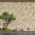 Decorative Lighting Illuminating Wavy Textured Wall With Tree Stones and Green Plants on Dark Floor