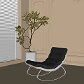Black Leather Leisure Chair With Curved Design And Silver Metal Frame In Modern Interior