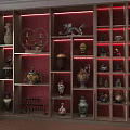 Decorative Ornaments Collection With Sculptures Vases And Figurines In Wooden Display Cabinet