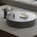 Round Gray Coffee Table with Mug Tray Teapot Spoon and Side Table with Vase 3d model