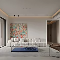 Modern Minimalist Living Room Interior With White Sofa Blue Coffee Table And Colorful Abstract Painting