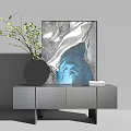 Modern Minimalist Entryway Console Cabinet With Gray Surface Potted Plant And Artwork