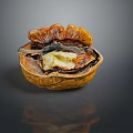 Opened Walnut with Brown Shell and Visible Yellow Kernel on Dark Background