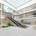 Modern Hospital Outpatient Clinic Lobby With Escalator Green Plants And Digital Screen