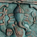 Turquoise Ganesha Carved Decorative Plaque With Intricate Border And Metal Stand Base