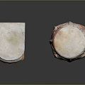 Two Decorative Stone Columns With Carved Leaf Motifs And Orange White Weathered Texture
