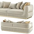 Beige Velvet Two Seater Sofa With Decorative Pillows And Gold Accents