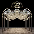 Garden Ornament Lighted Arch With Happy New Year Sign And Geometric Patterns On Brick Floor