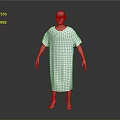 Human Figure Sculpture in Polka Dot Hospital Gown with Bald Head Standing on Gray Background