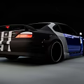 Blue Sports Car With Black And White Stripes Modified Rear Spoiler And Sporty Wheels