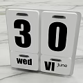 White Block Calendar Showing 30th Wednesday June Date on Marble Surface