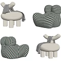 Modern Single Sofa With Green Striped Design Plush White Upholstery And Decorative Throw Blanket