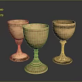 Three Vintage Decorative Ceramic Cups With Intricate Patterns And Ornate Bases