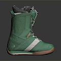 Green Snowboard Boots With White Laces Orange Sole And Soft Inner Lining Design