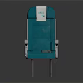 Comfortable Teal Upholstered Airplane Seat With White Headrest And Metallic Armrests